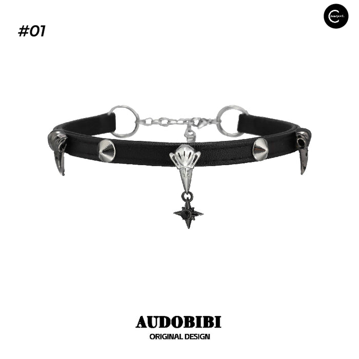 A Part Of Me Raven Series black choker necklace with metal spike details and dangling charm, variant #01