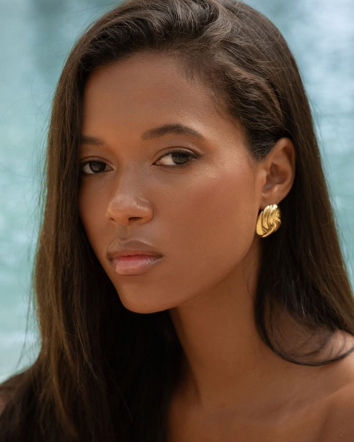 Woman wearing stud earrings