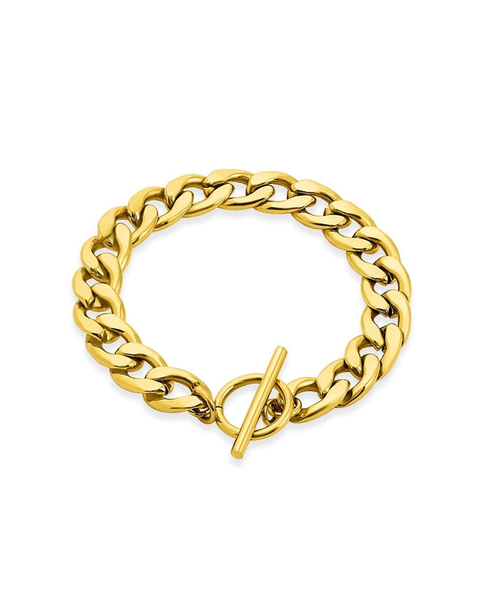 gold chunky bracelet on white background