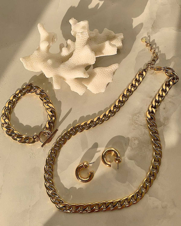 BOLD MOVE BRACELET, CHUNKY CUBAN CHAIN NECKLACE, AND GOLD HOOP EARRINGS