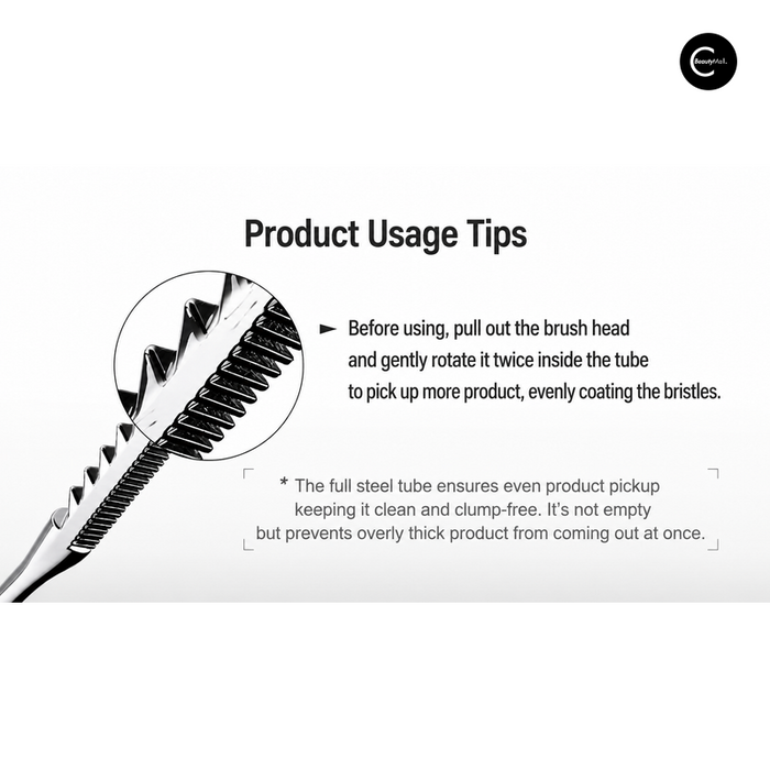 Close-up of a mascara brush head showing comb teeth and product usage instructions.