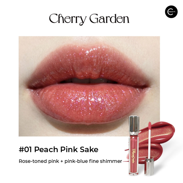 Cherry Garden lip glaze in #01 Peach Pink Sake, rose-toned pink with shimmer, shown on lips with applicator