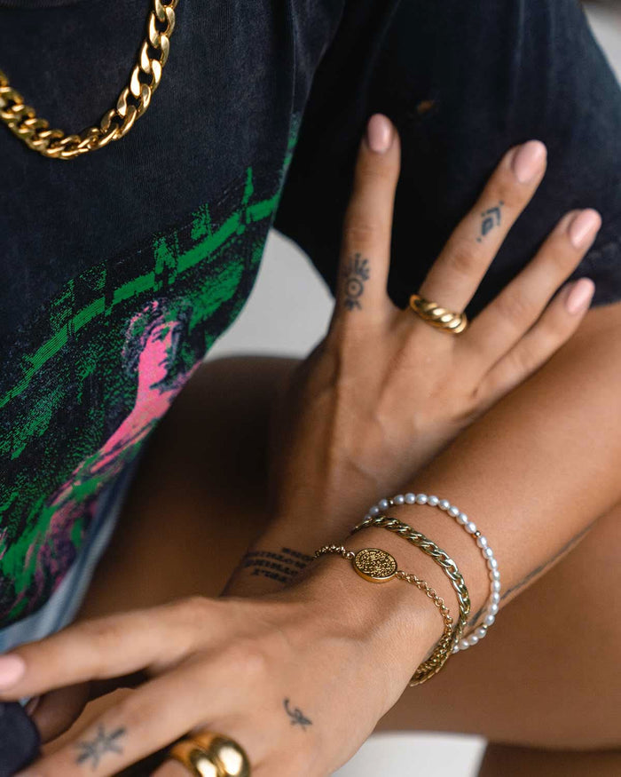 Cult of Sun bracelets, rings, and necklace
