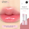 Flortte Blooming lipstick in shade 01 Peach, shown on lips beside the pink tube and open lipstick