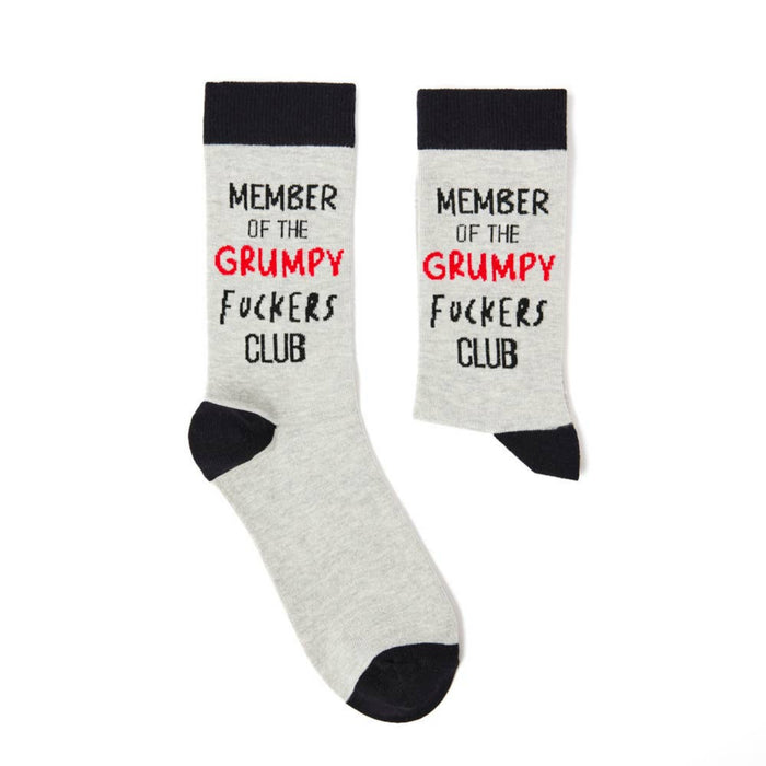Pair of grey novelty socks with black trim featuring grumpy club slogan design