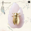HUAZHUANGJI Y01 Peach Leaf Moon Silk highlighter and contour palette with a gold beetle design