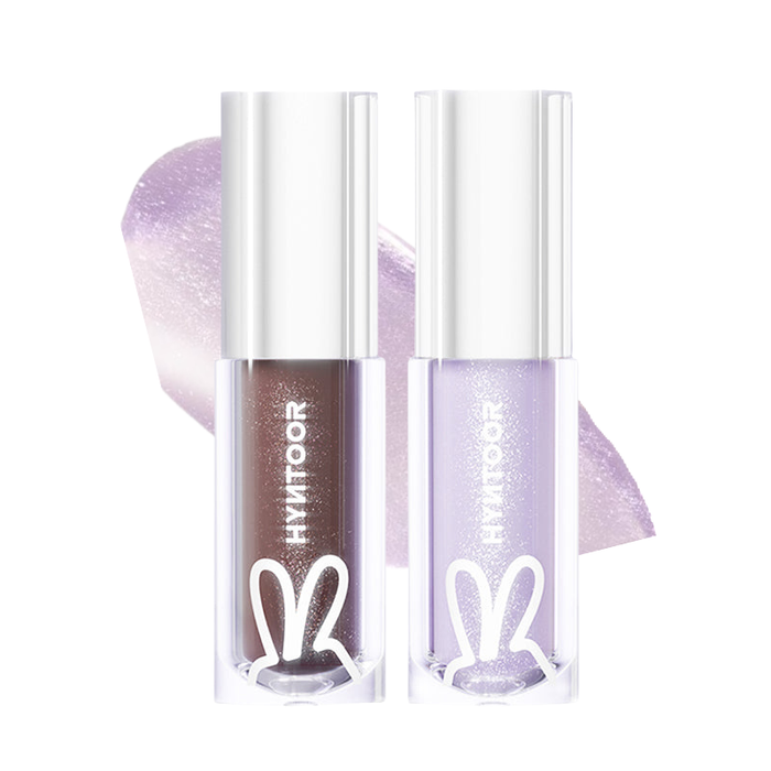Two HYNTOOR Future Planet lip gloss tubes with silver caps, shown in brown and lavender shades with swatches