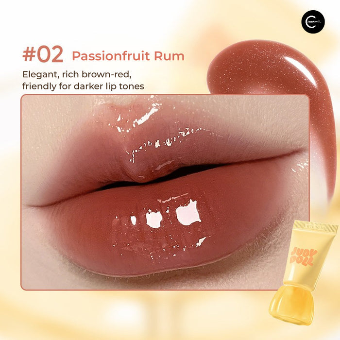 JUDYDOLL Jelly Lip Gloss in #02 Passionfruit Rum, brown-red gloss shown on lips with tube