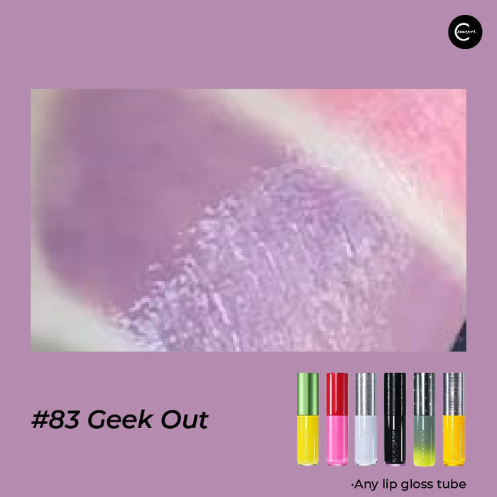 KALEIDOS Lunar Arcade Electro-Gloss lipstick in #83 Geek Out, close-up swatch with product tubes