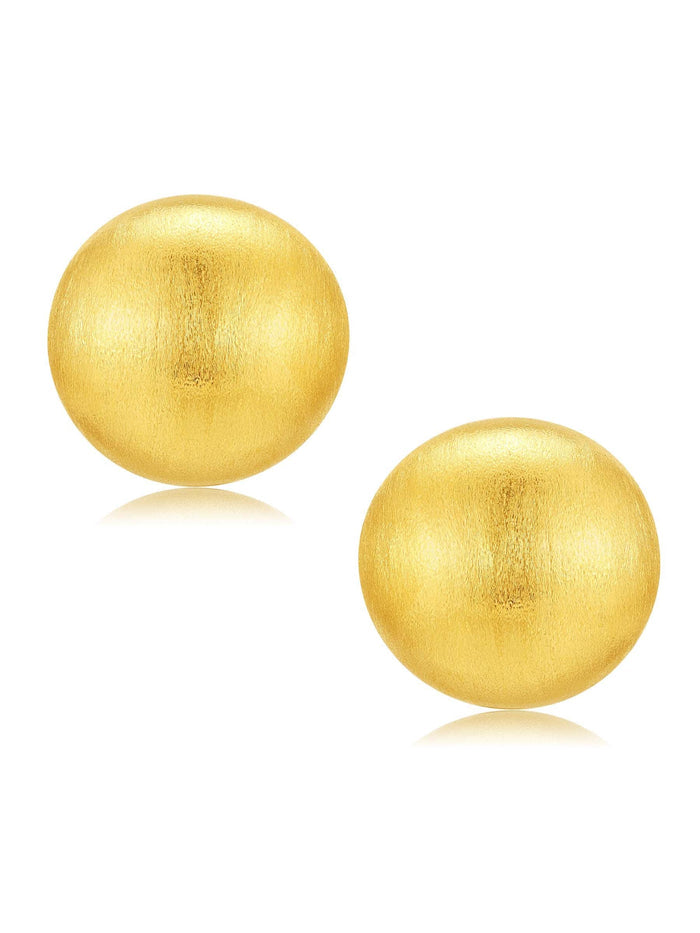 large gold studs on white background