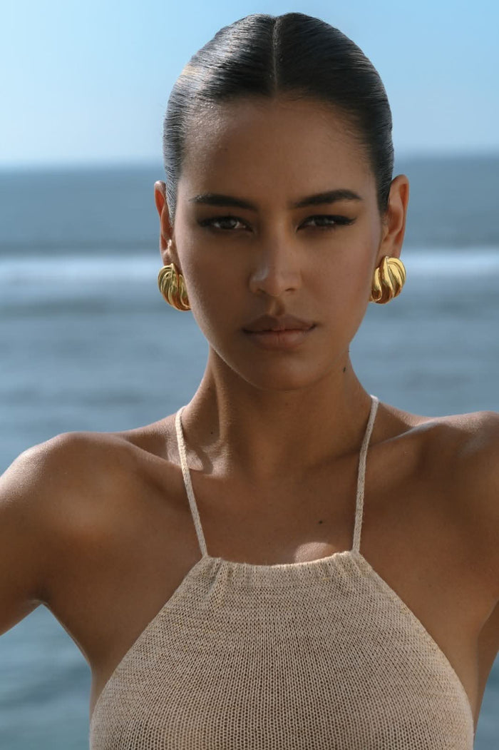 big gold earrings on annabel lewis
