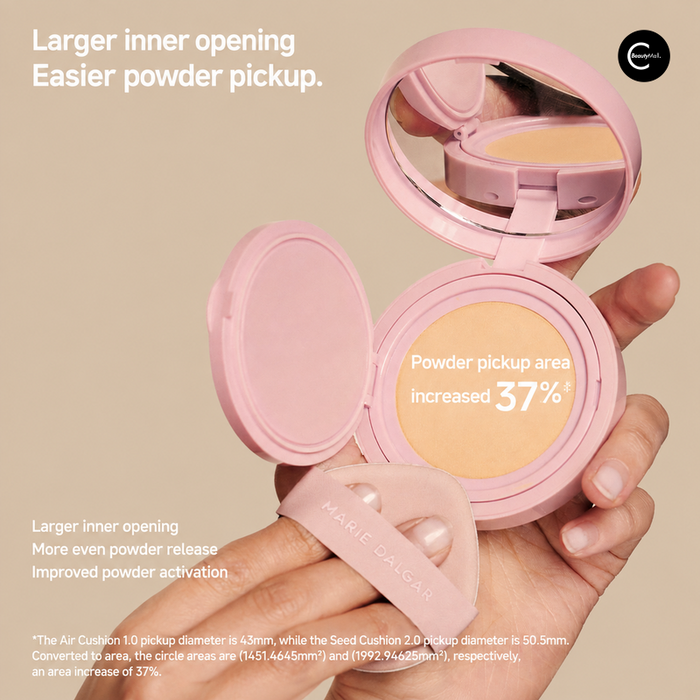 Marie Dalgar pink cushion compact shown open with powder pan and puff