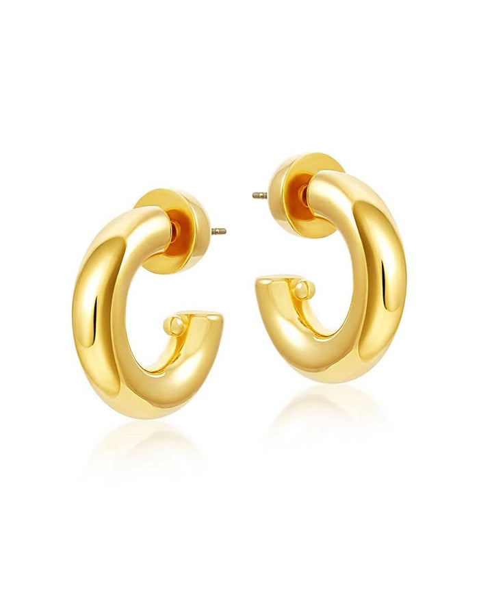 Chunky hoop earrings on white background