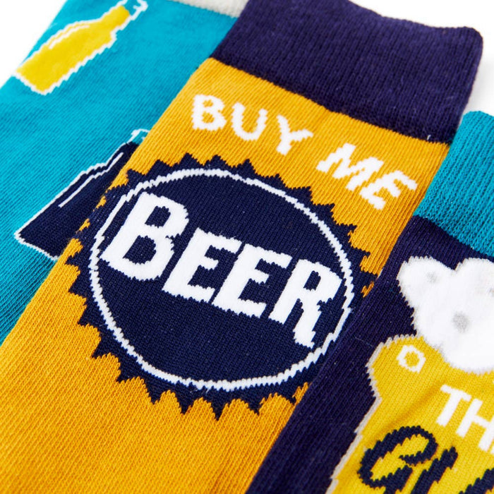close up of beer themed socks with buy me beer slogan