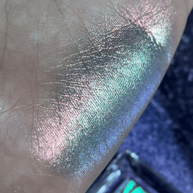 NOIRICORN Alien Flora single eyeshadow swatch showing shifting pink, green, blue and silver tones