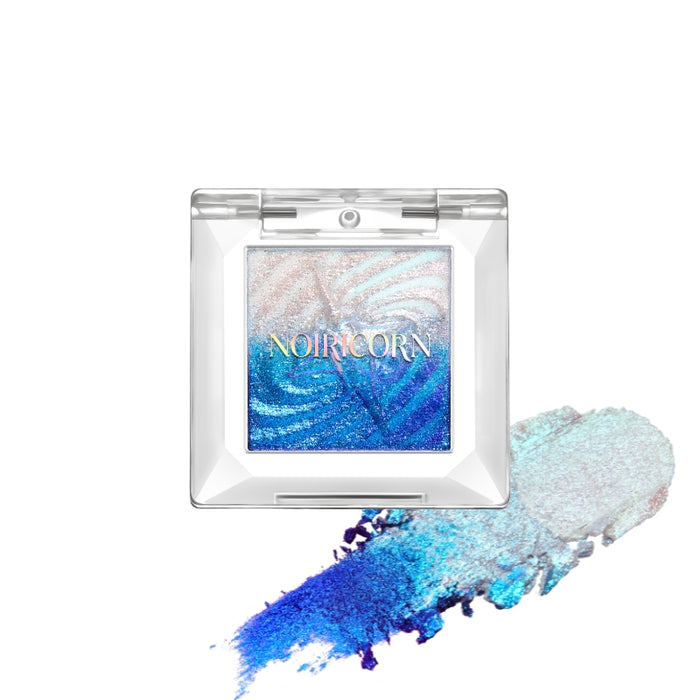 NOIRICORN Lunar Water single eyeshadow pan with blue, silver, and lavender swatches