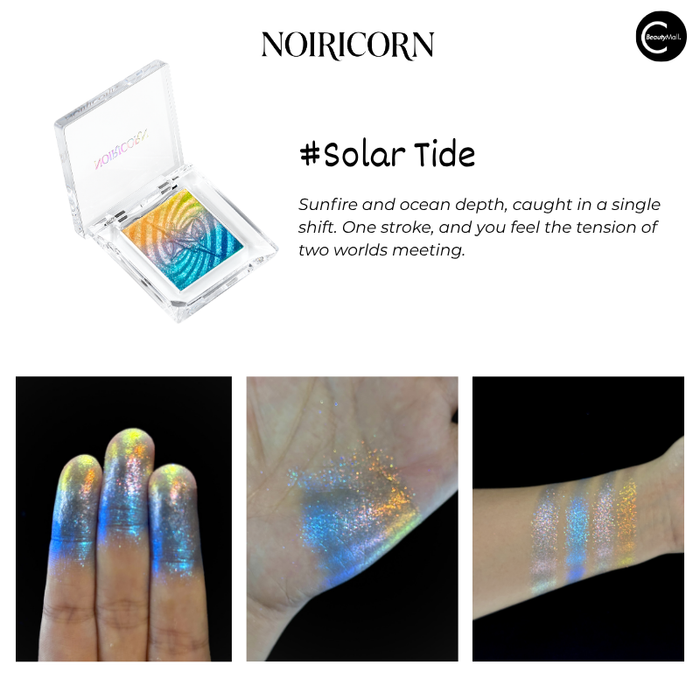 NOIRICORN Solar Tide eyeshadow pigment single in a clear compact with blue, gold and pink shimmer swatches