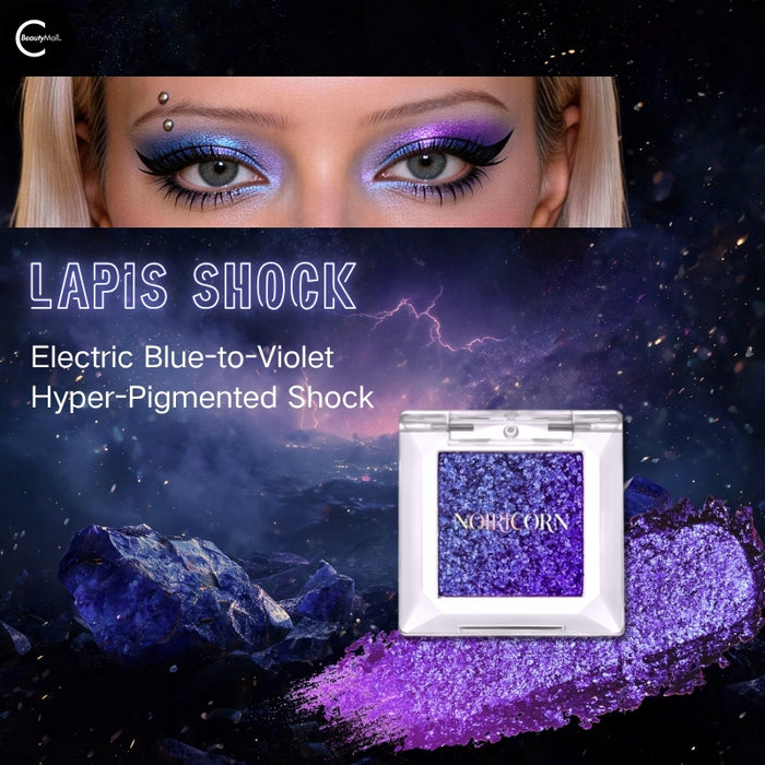 NOIRICORN Lapis Shock single eyeshadow with blue-to-violet shimmer, shown open with purple pigment swatch