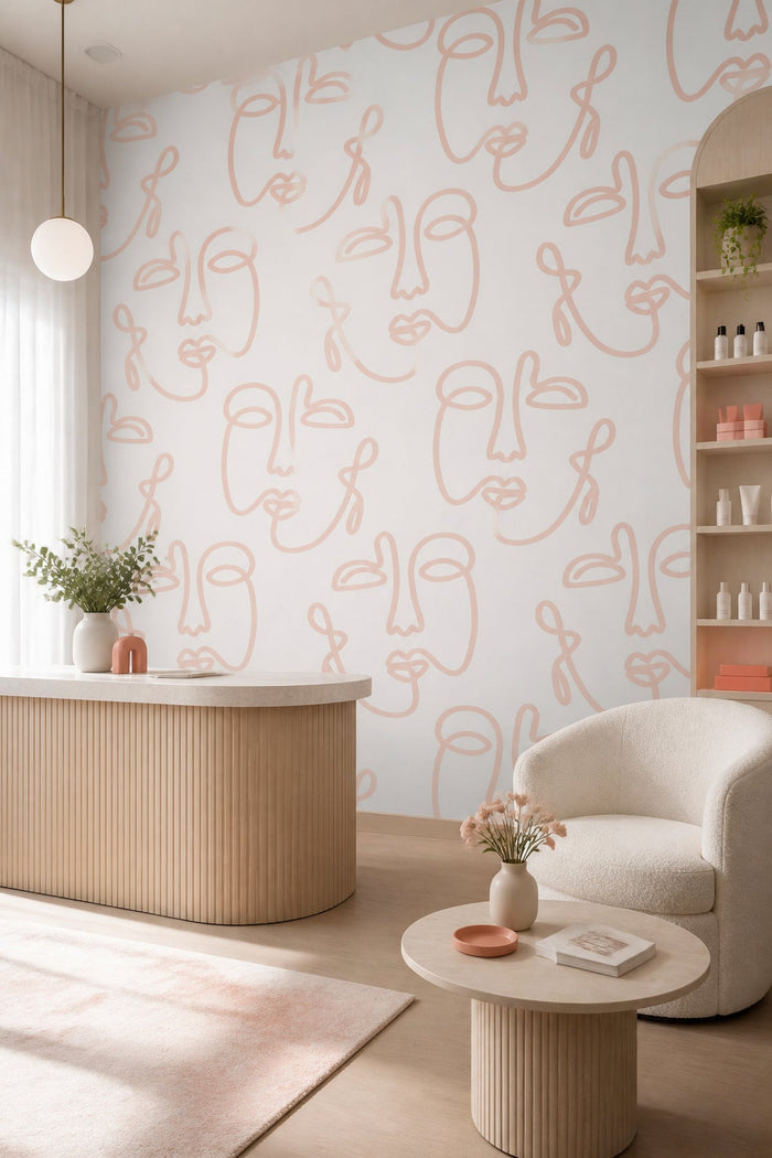 Pale Pink Empty Abstract Faces wall mural behind a lounge chair