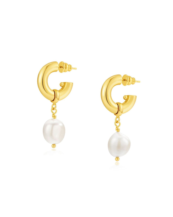 chunky hoops with pearl earrings on white background