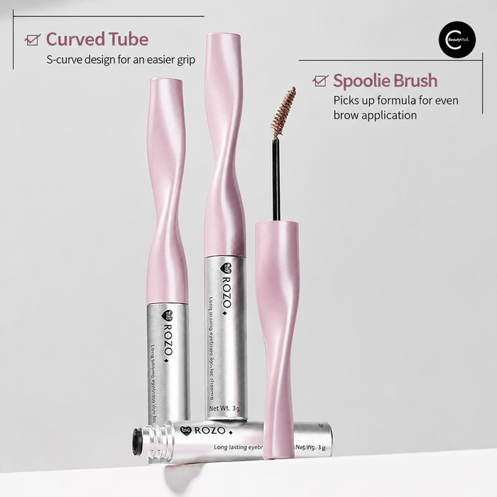 ROZO eyebrow styling gel in pink and silver tubes with a curved design and exposed spoolie brush