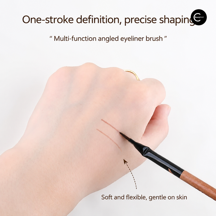 Angled eyeliner brush demonstrating line application on the hand