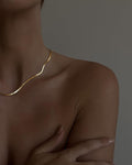 snake chain choker gold on a model