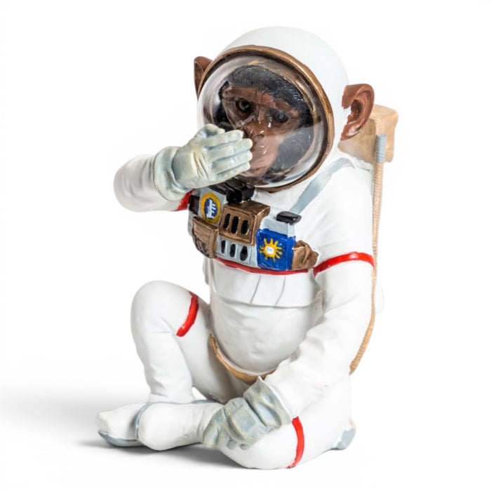 Front view of speak no evil astronaut chimpanzee ornament in white space suit
