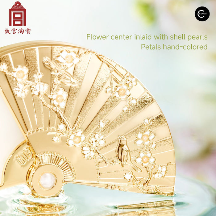 The Palace Museum folding fan solid perfume balm, gold fan-shaped compact shown closed