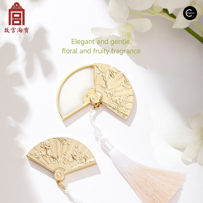 The Palace Museum folding fan solid perfume balm, opened and closed, with tassel detail