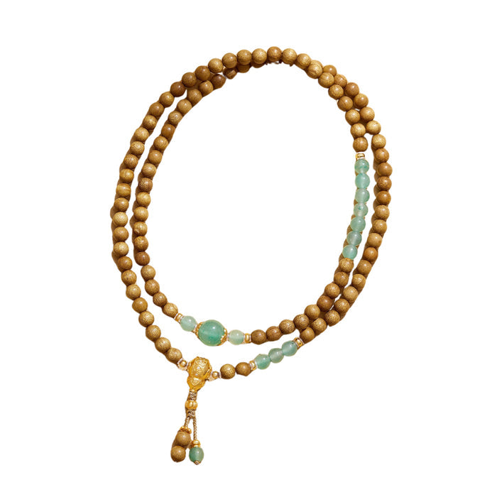 The Palace Museum Golden Jade Gourd Golden Silk Nanmu beaded bracelet with brown and green beads, front view