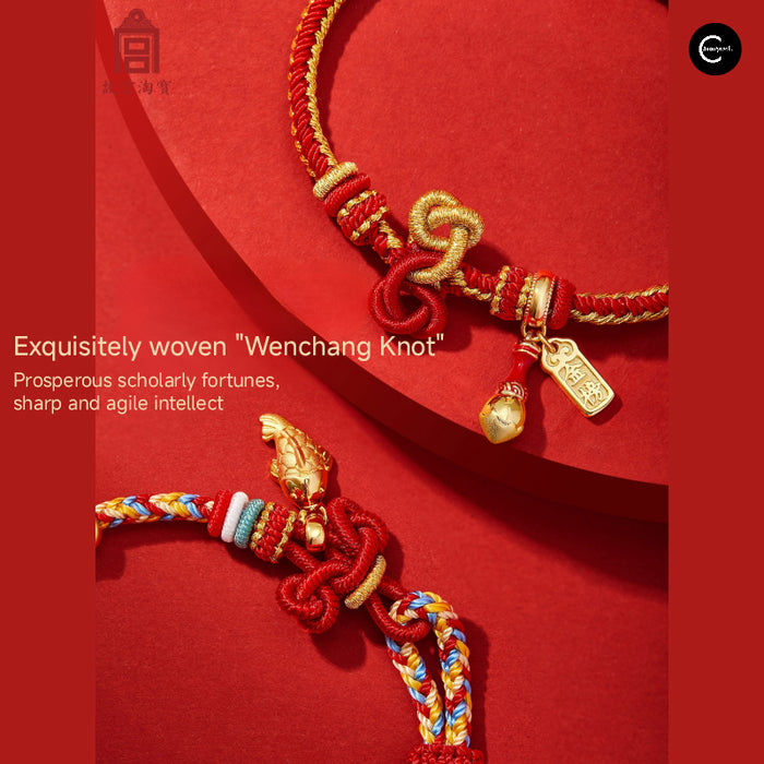 The Palace Museum red and gold woven bracelet with decorative knots and hanging charms, shown close up