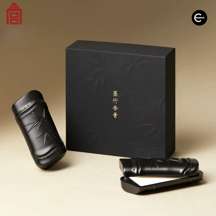 The Palace Museum Ink Bamboo solid perfume in black bamboo-style cases with a black presentation box