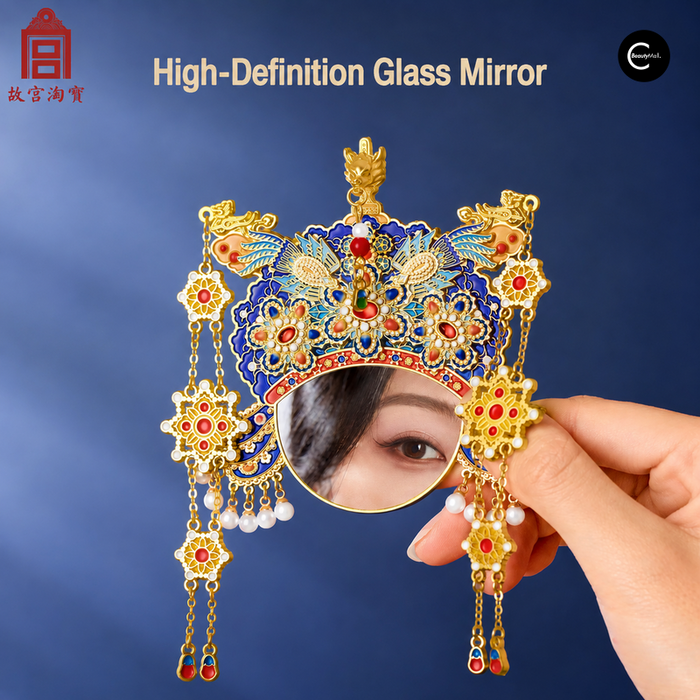 Gugong Taobao ornate blue and gold handheld mirror showing an eye reflection