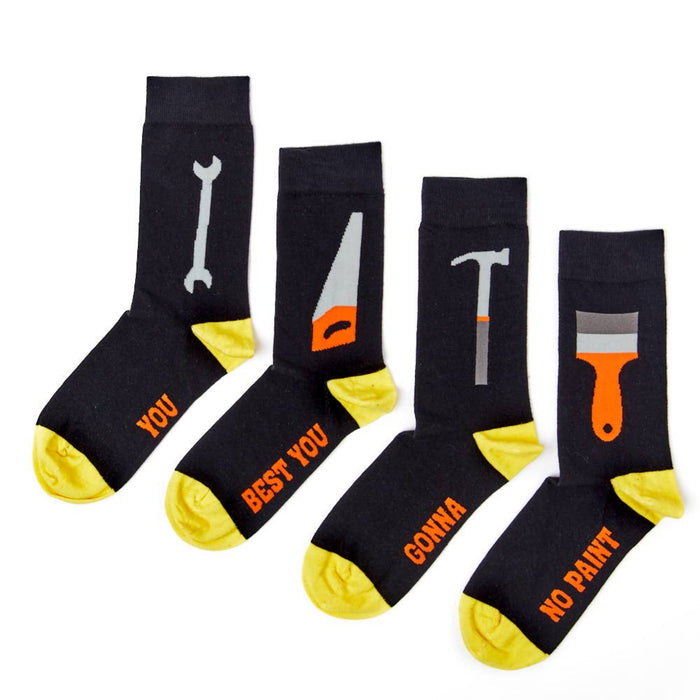 four pairs of men’s tool themed socks laid out with different designs