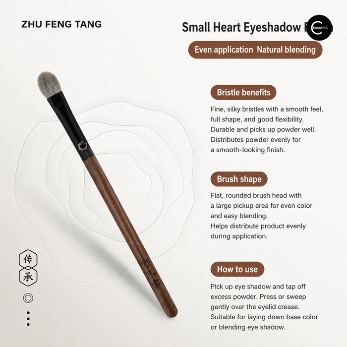 Zhu Feng Tang eye shadow brush with brown wood handle and rounded gray bristles